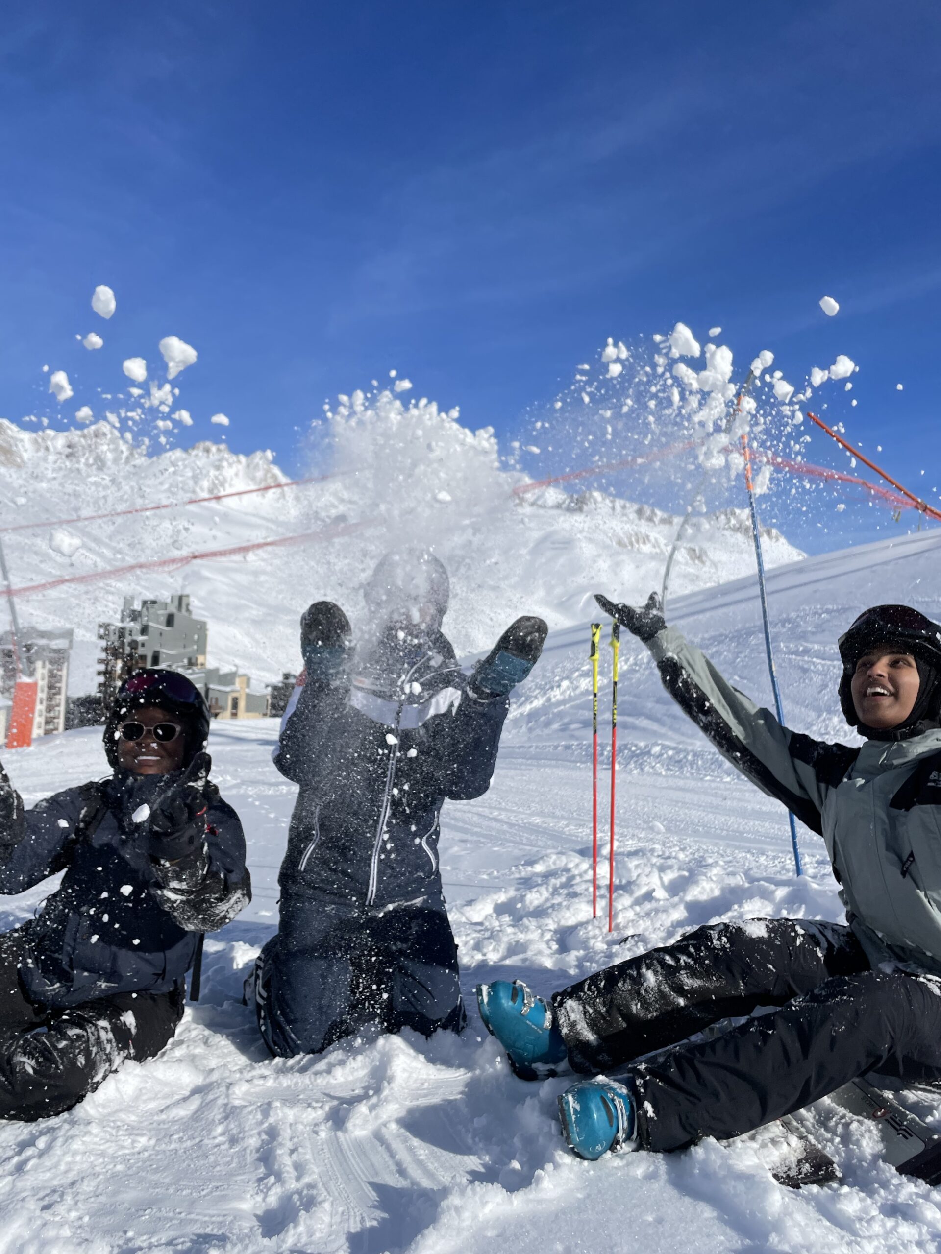 ULOTC officers enjoying the fresh snow by throwing it in the air. 