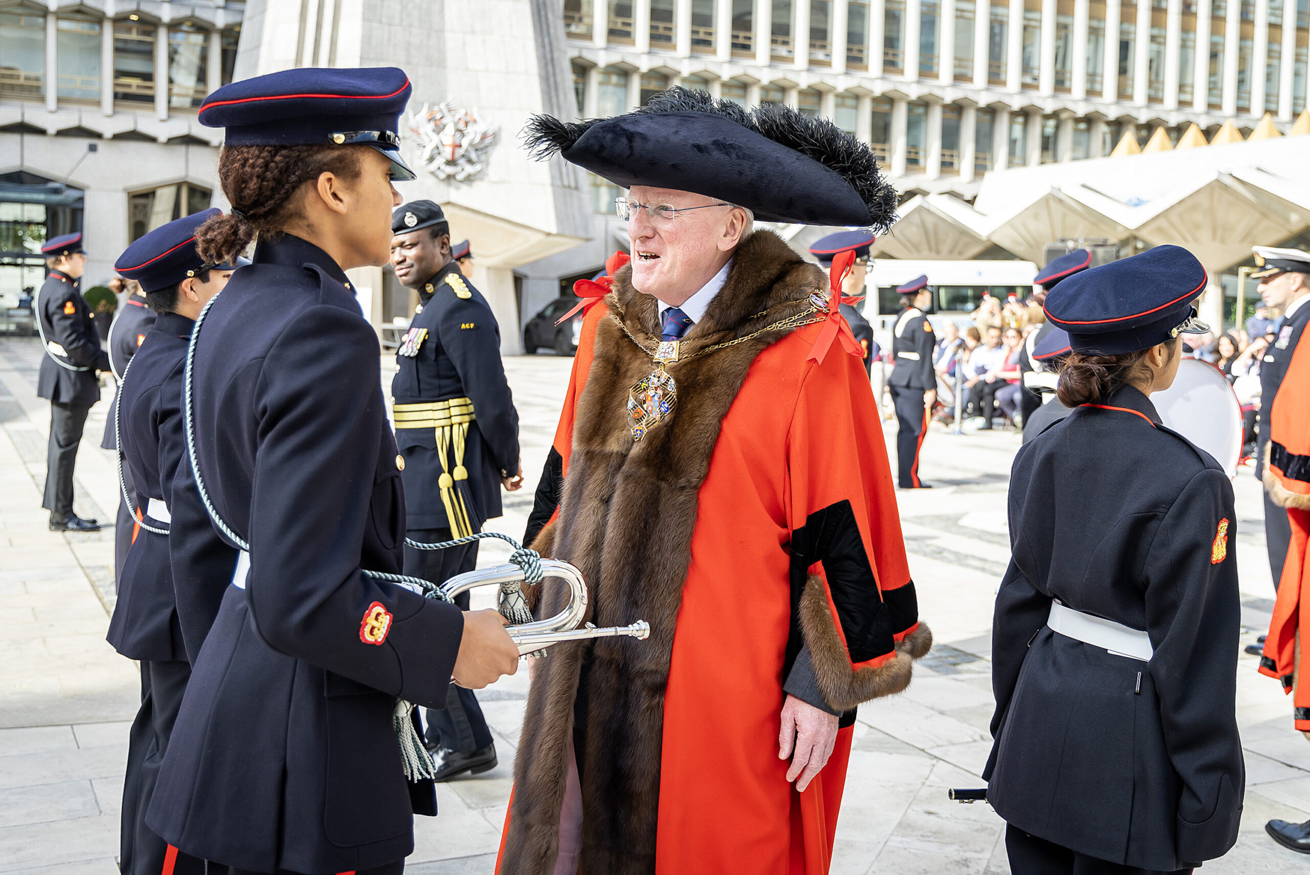Lord Mayor of City of London talking to a music cadet at the Guildhall Yard