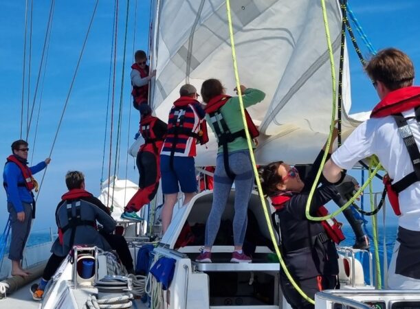 ULOTC Members sailing on a boat during Exercise Cockney Sailor