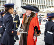Lord Mayor of City of London talking to a music cadet at the Guildhall Yard